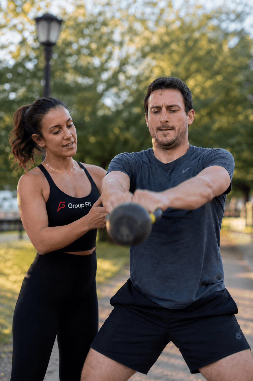Coach training a client one on one